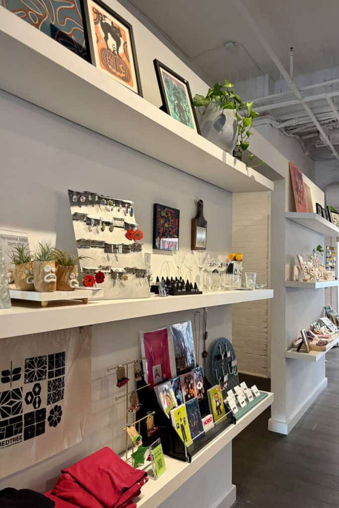 Artisan products including cards and jewelry.