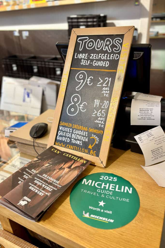 Sign listing tour prices at Cantillon Brewery.