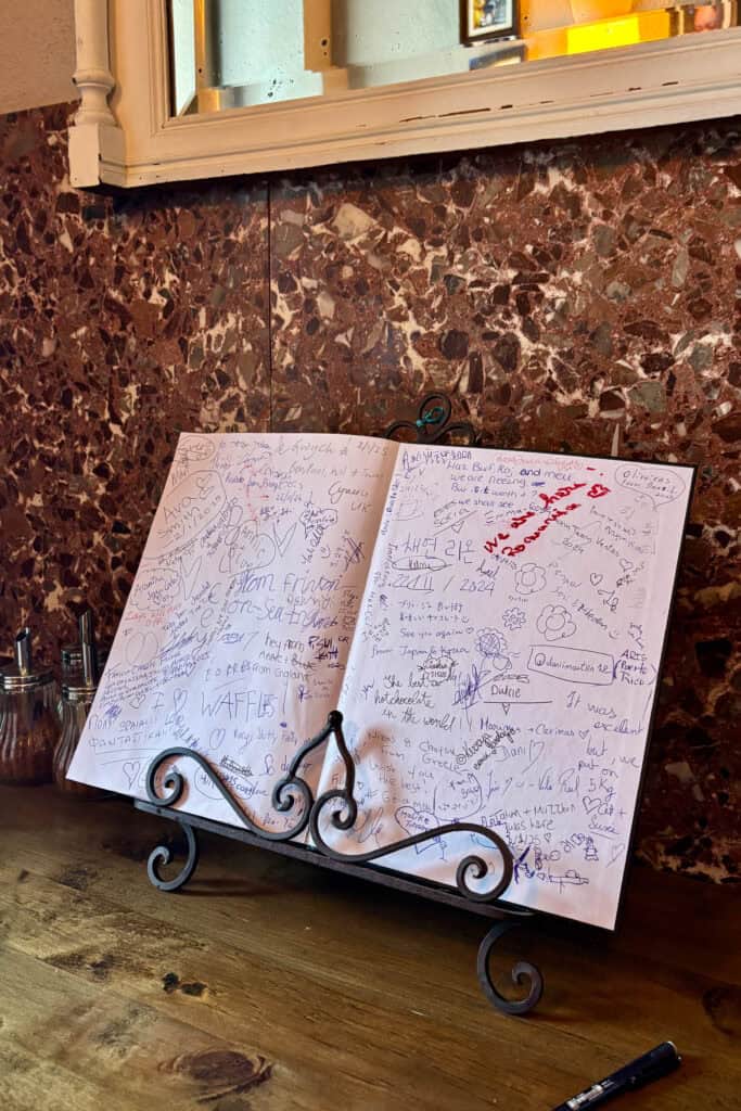 Guest book full of signatures.