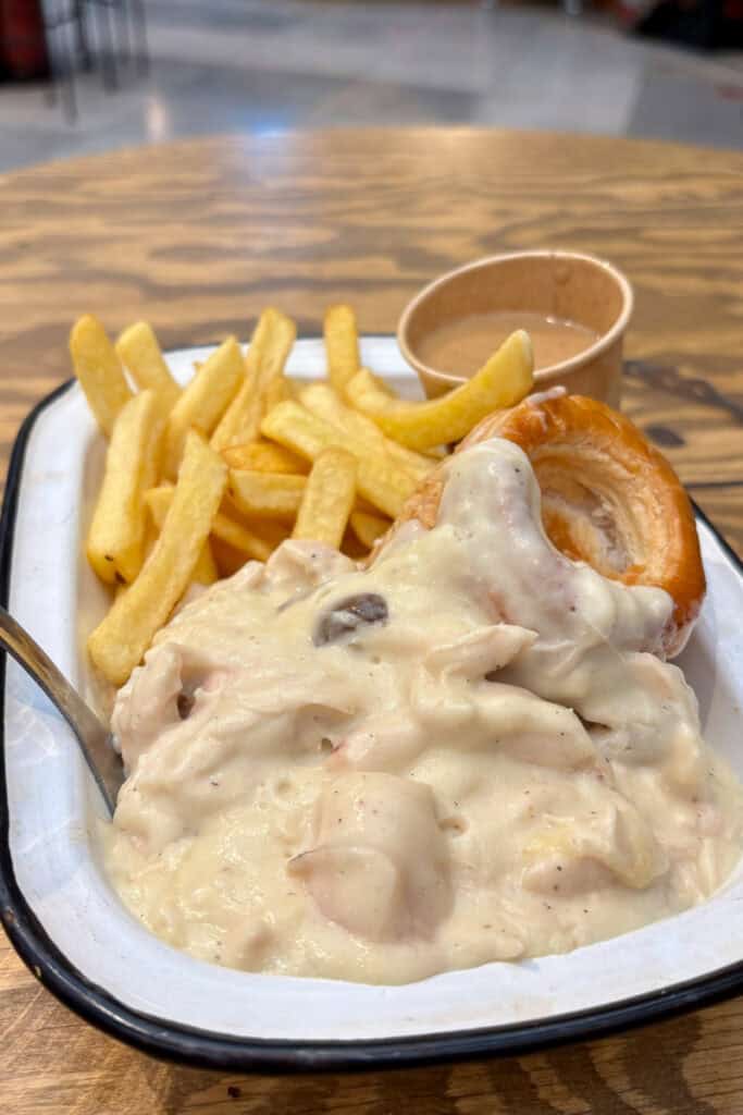Vol-au-vent, with fries, pastry, and gravy.