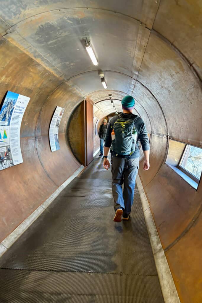 Interior of lighted tunnel providing access to viewing platform atop Aiguille du Midi.