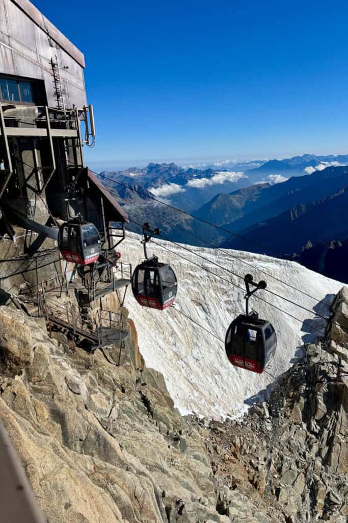 Small cable cars approaching viewing platform atop Aiguille du Midi.
