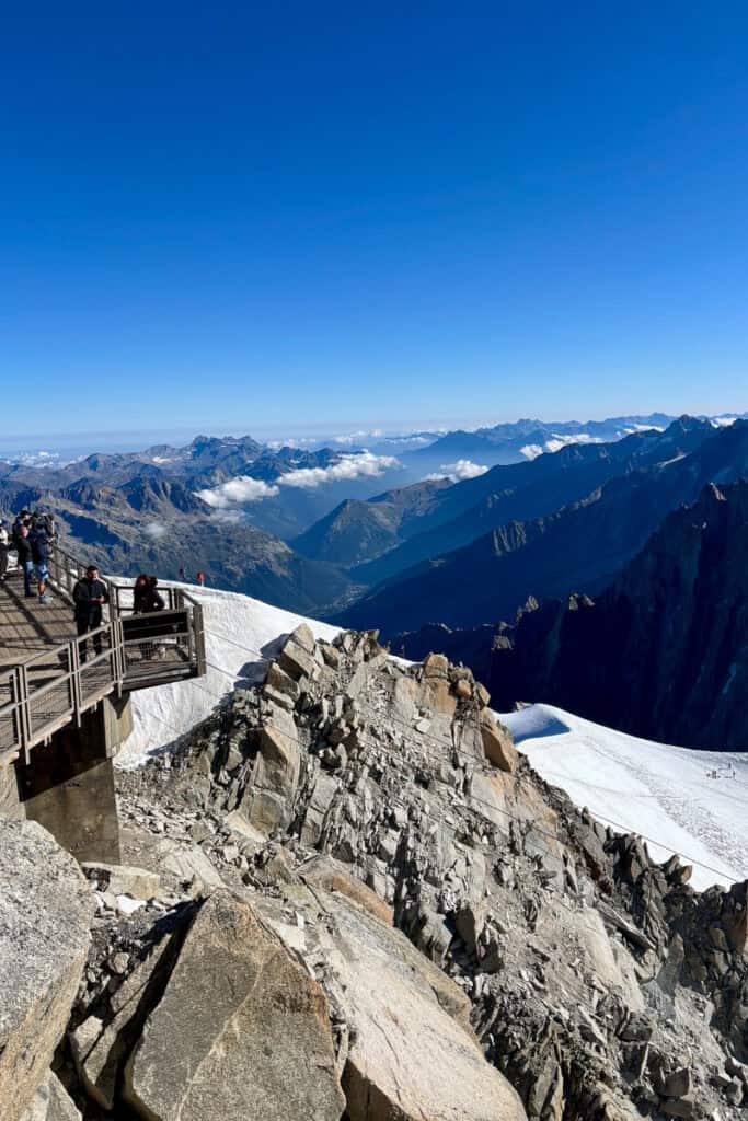 View from platform atop Aiguille du Midi across distant expanse of peaks.