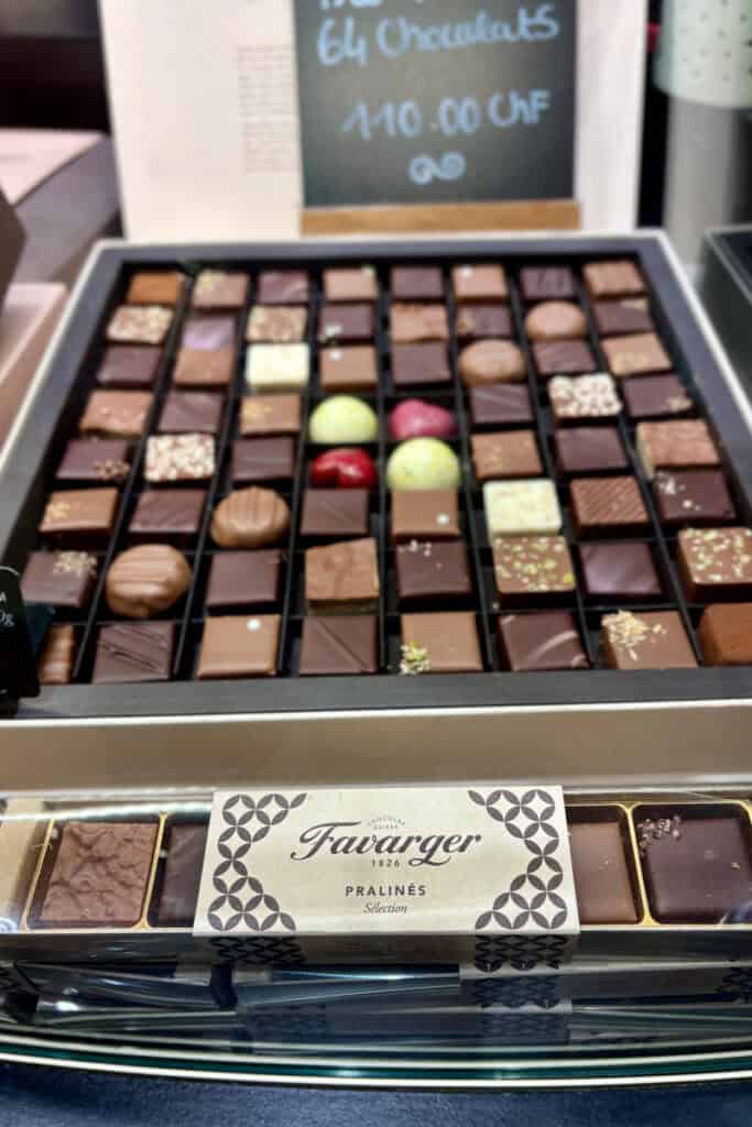 Boxes of chocolates and pralines for sale.