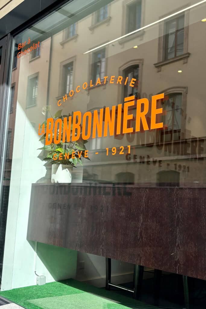 Window sign for La Bonbonniere Chocolaterie, a Choco Pass participating location.
