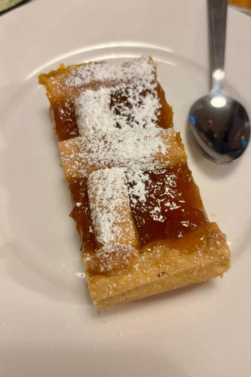 Slice of pie with criss-cross crust.