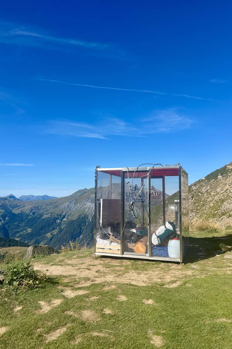 Tall clear compartment holding ultramarathon drop bags on the Tour du Mont Blanc.