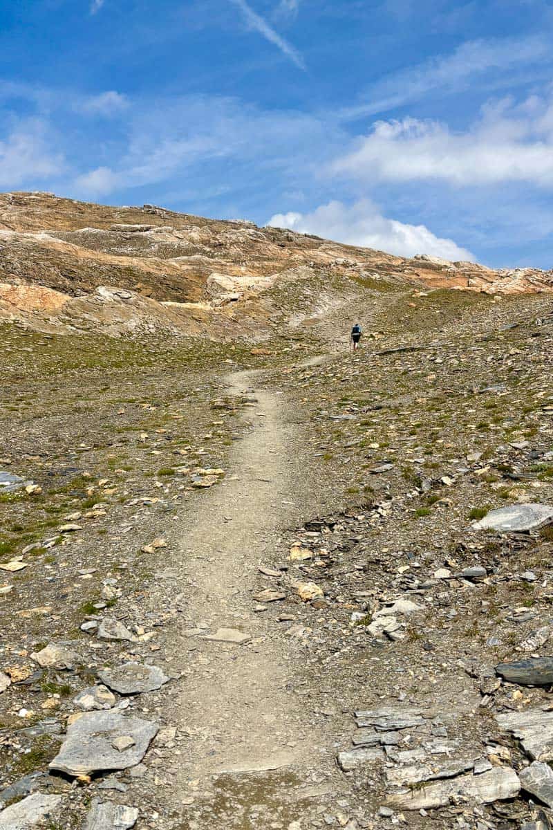 Dirt and rock trail leading to Col des Fours.