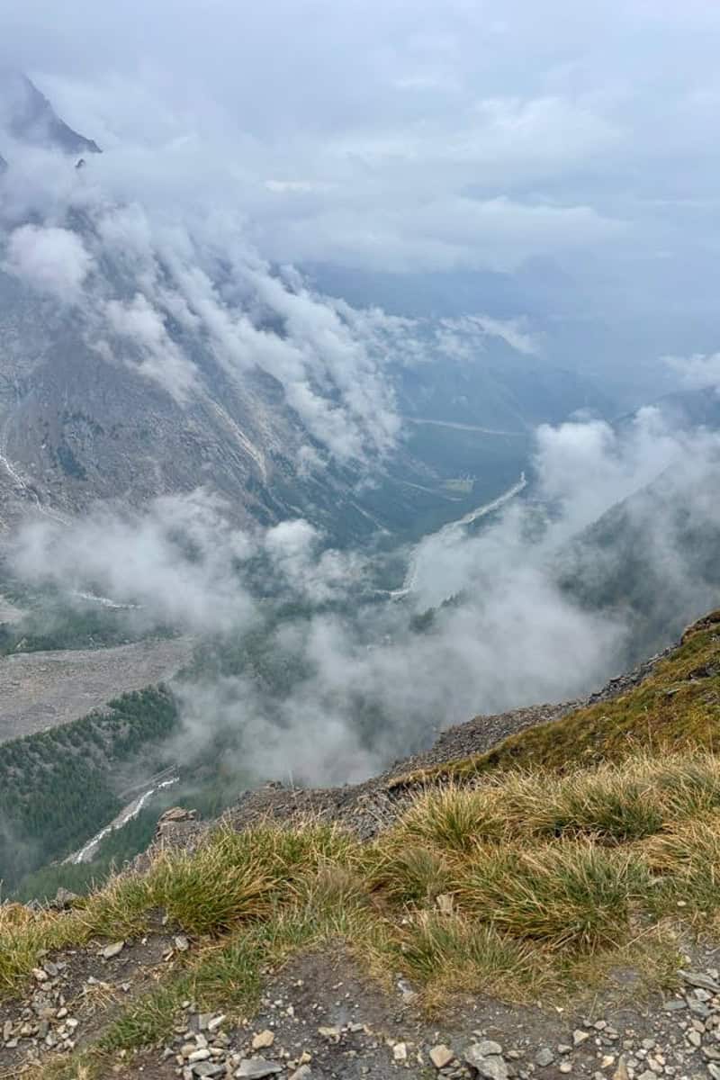 Cloud covered mountain slopes.