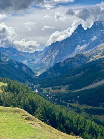 View of Val Ferret alpine valley with towering peaks above.