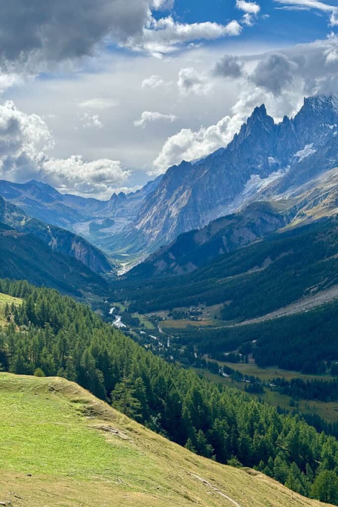 View of Val Ferret alpine valley with towering peaks above.