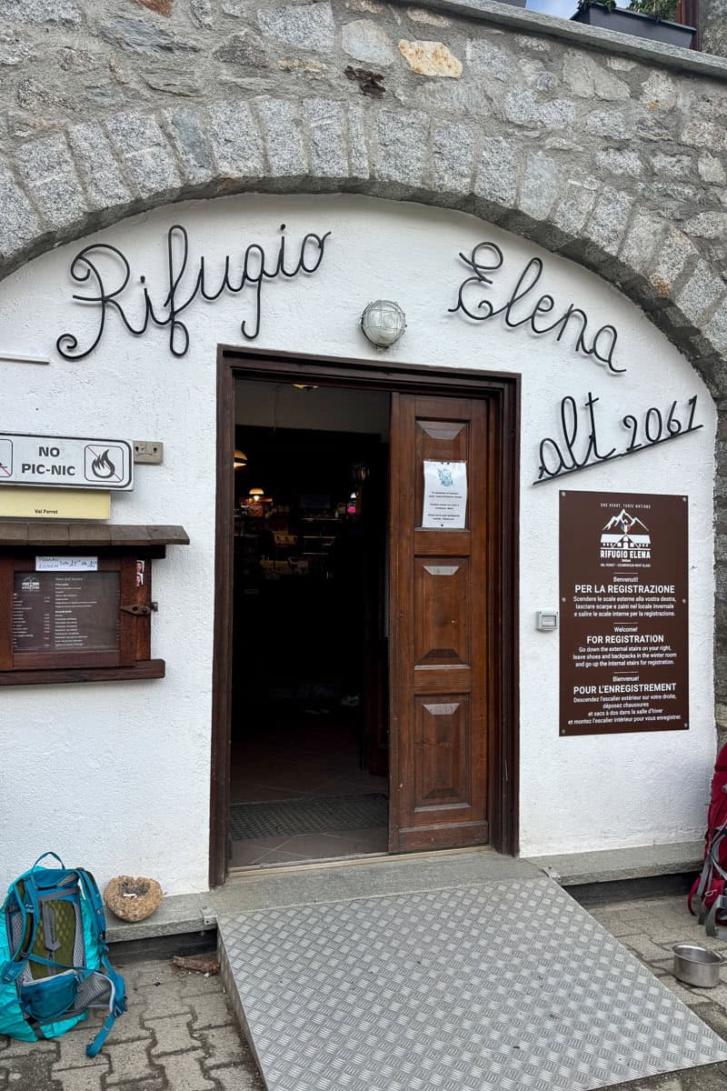Entrance to Rifugio Elena lodge for hikers on Stage 6 of the Tour du Mont Blanc.