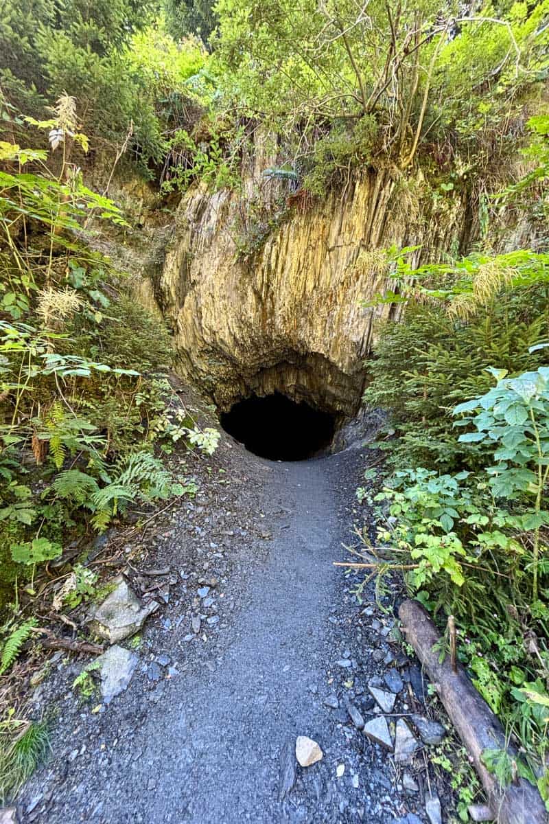 Cave opening alongside trail on Stage 7 of the Tour du Mont Blanc.