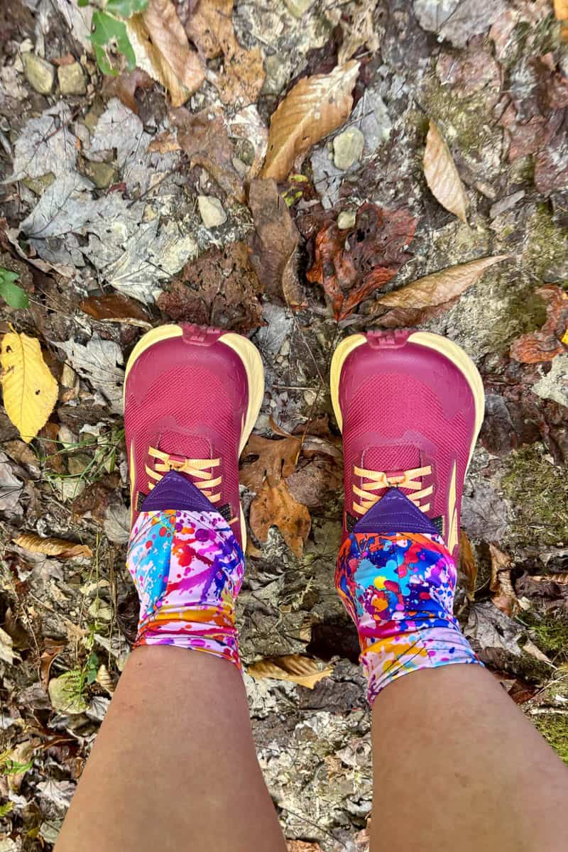 Altra Timp shoes worn on hiker's feet.