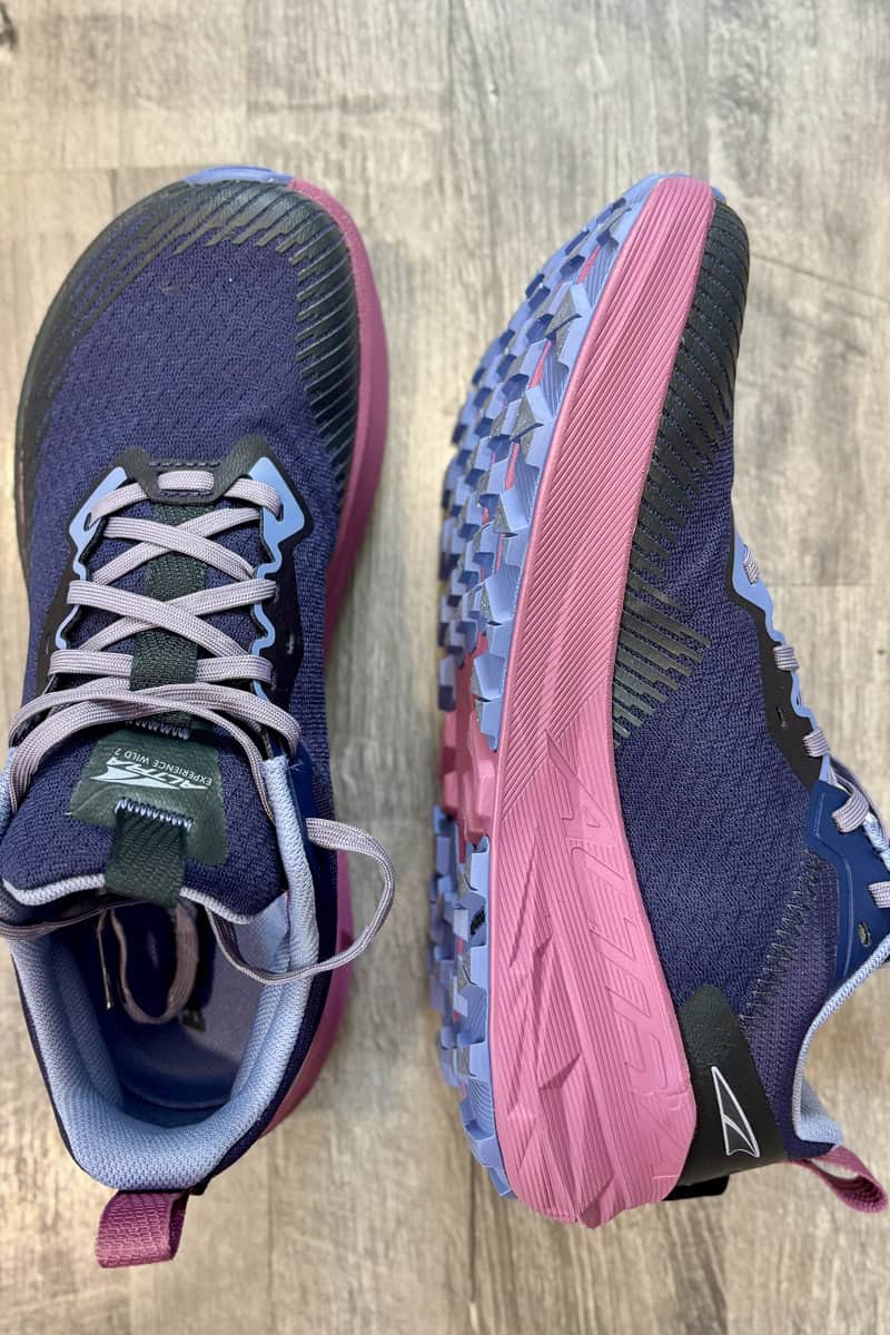Pair of Altra Experience Wild trail runners, with one shoe turned to show the side profile.