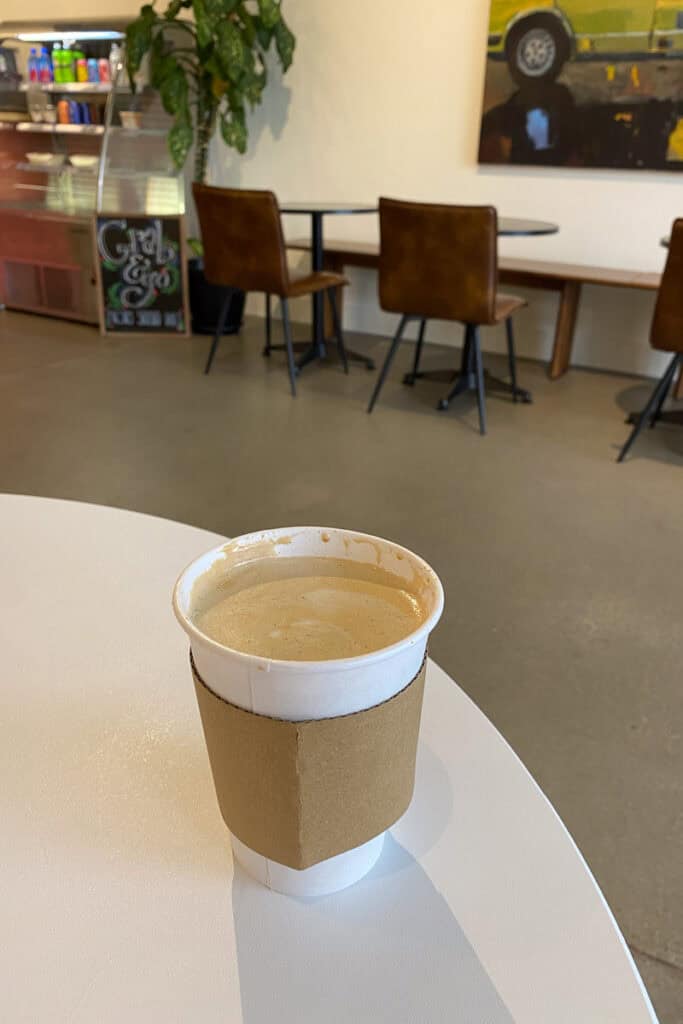 Latte with black sesame cream served at Floating Lotus Kitchen.