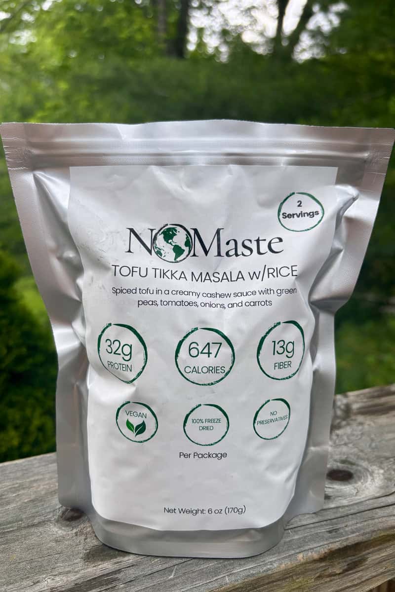 Sealed package of NoMaste brand freeze dried meal of tofu tikka masala.