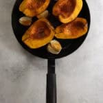 Pieces of autumn frost squash and onion after roasting.