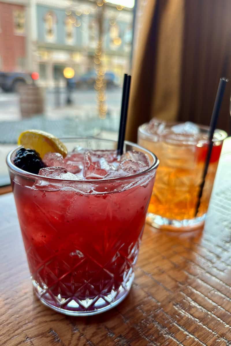 Blackberry old fashioned and classic old fashioned cocktails.