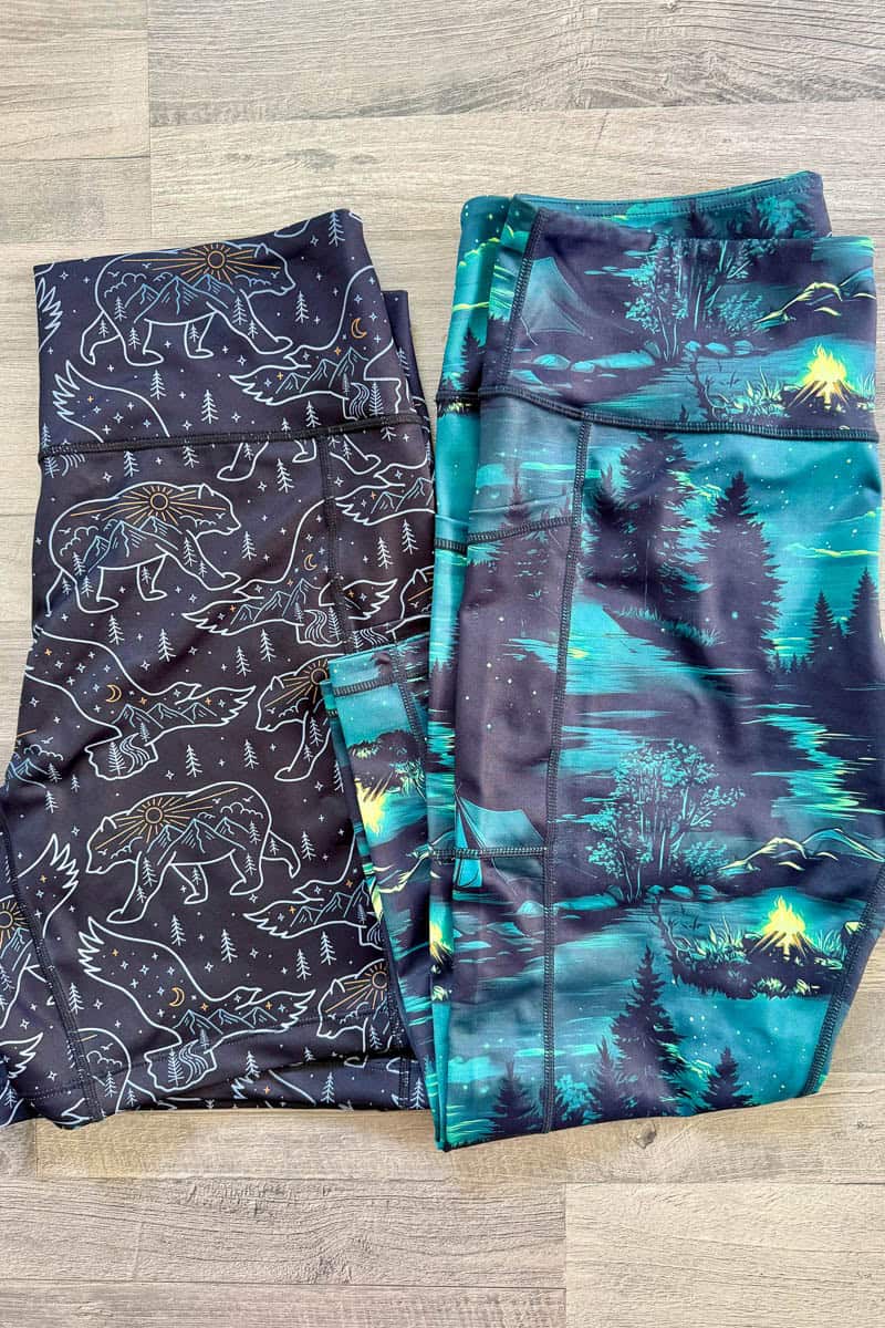 Two pairs of leggings with outdoor themed prints, possible gifts for trail runners.