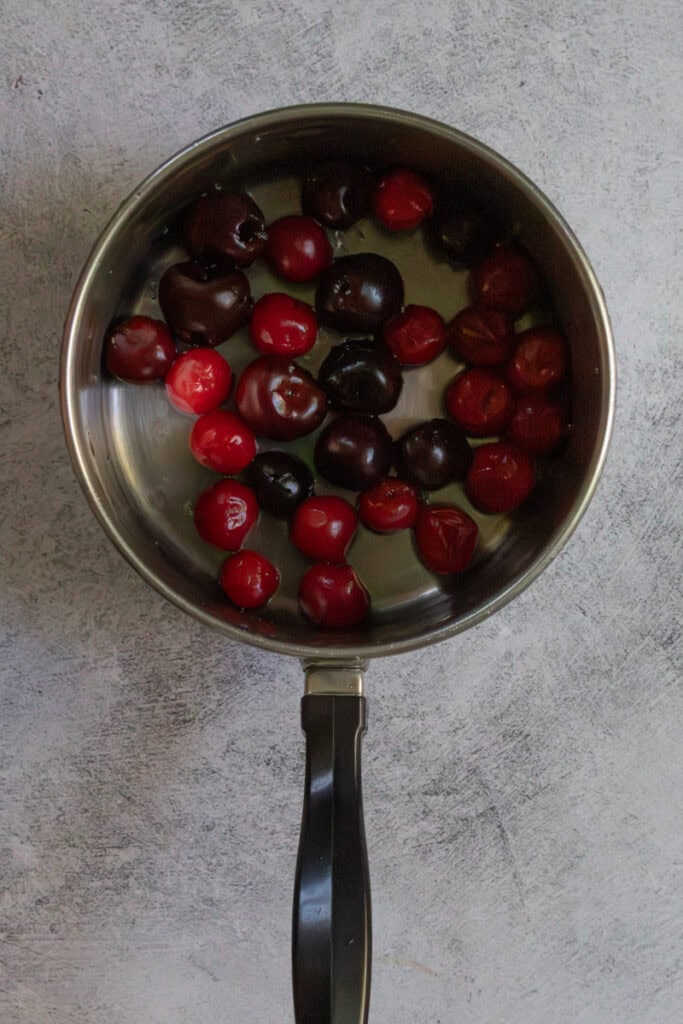 Cherries in saucepan.