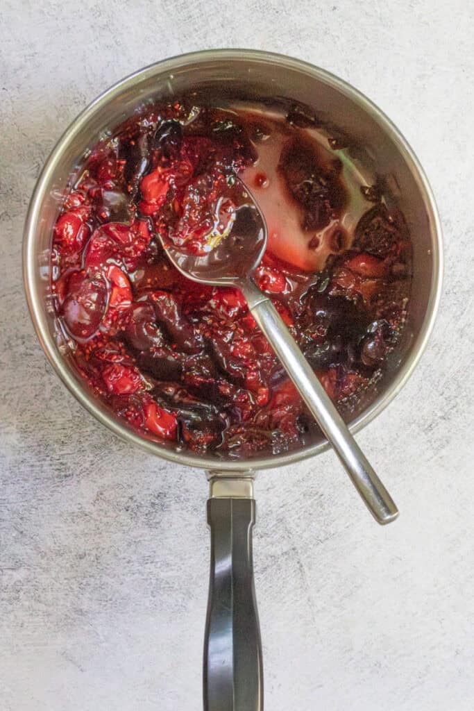 Chia seed and fruit compote in sauce pan after cooking.