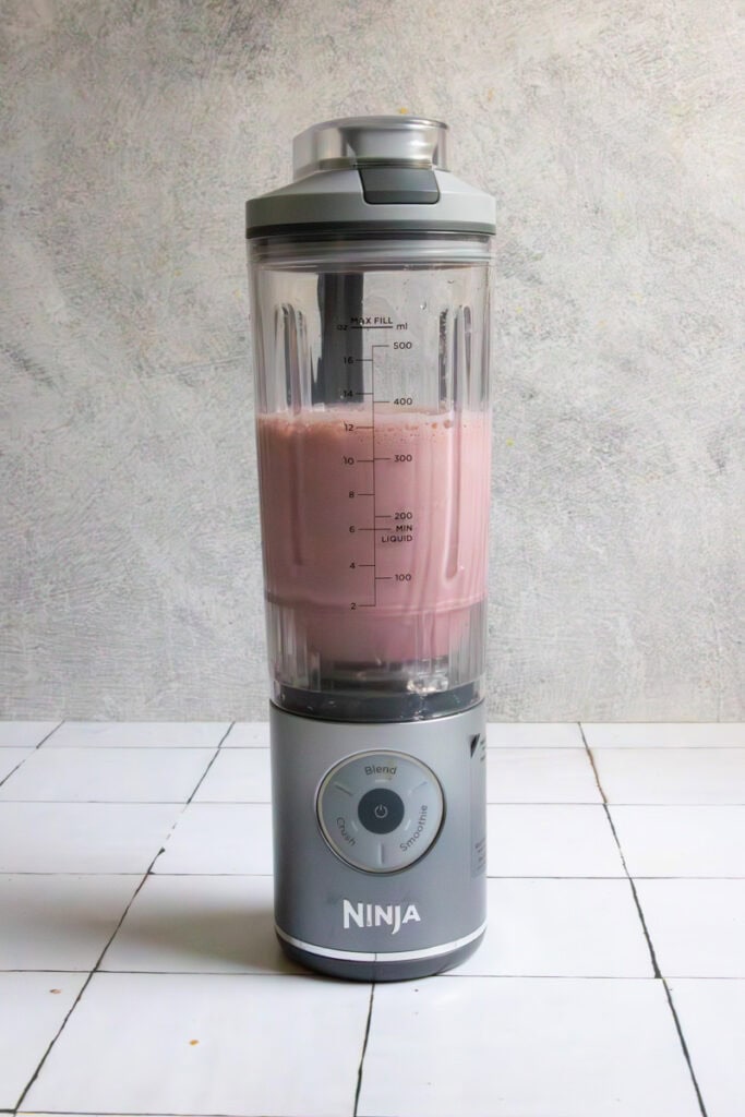 Smoothie mixture in blender.
