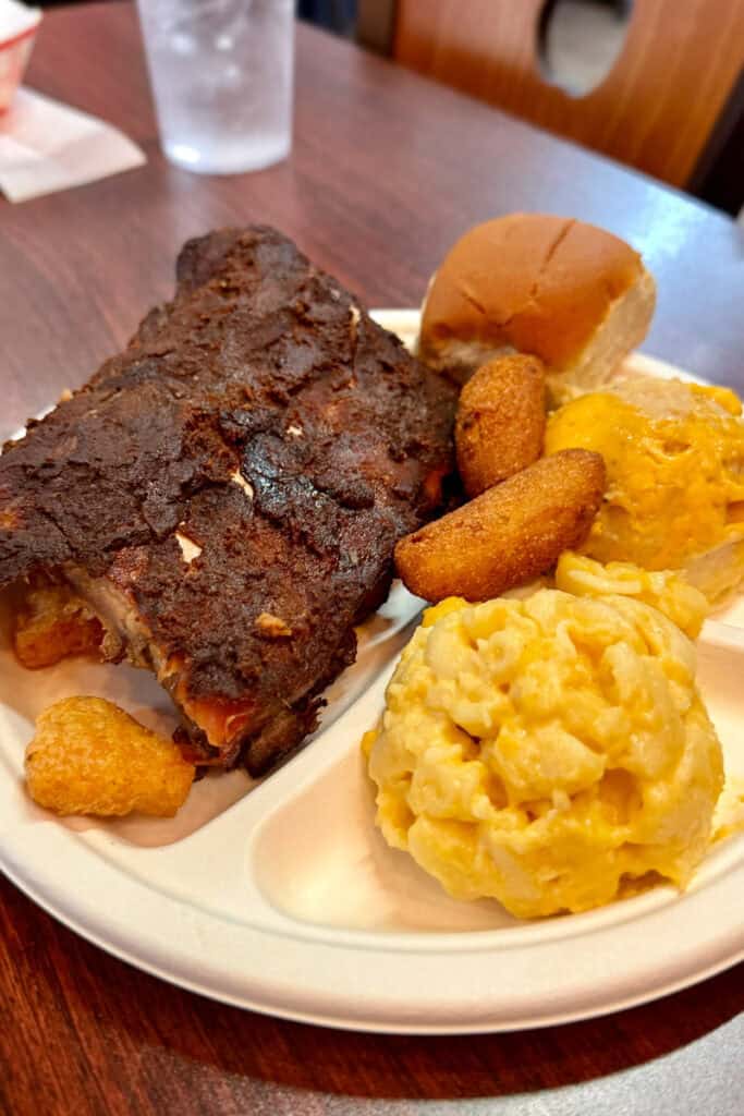 Half-rack of ribs with macaroni and cheese and mashed potatoes.