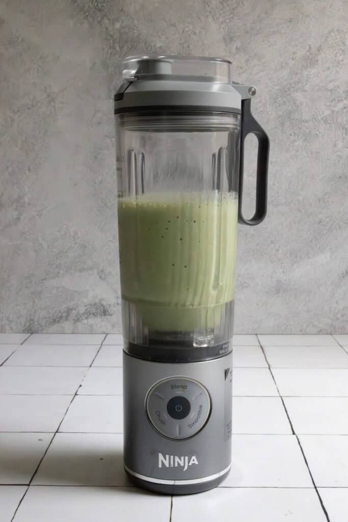 Smoothie mixture in blender.