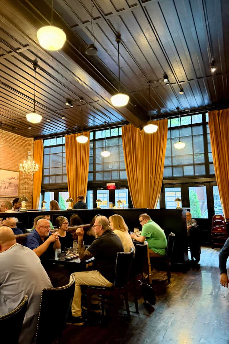 Busy indoor dining area at Mussel and Burger Bar.