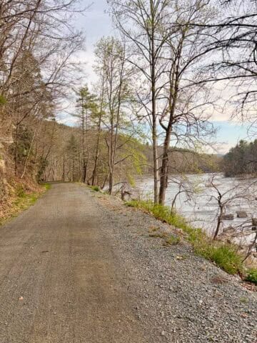 Gravel path alongside bank of New River.