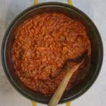Turkey bolognese sauce after tomato puree, tomato paste, and broth are added.