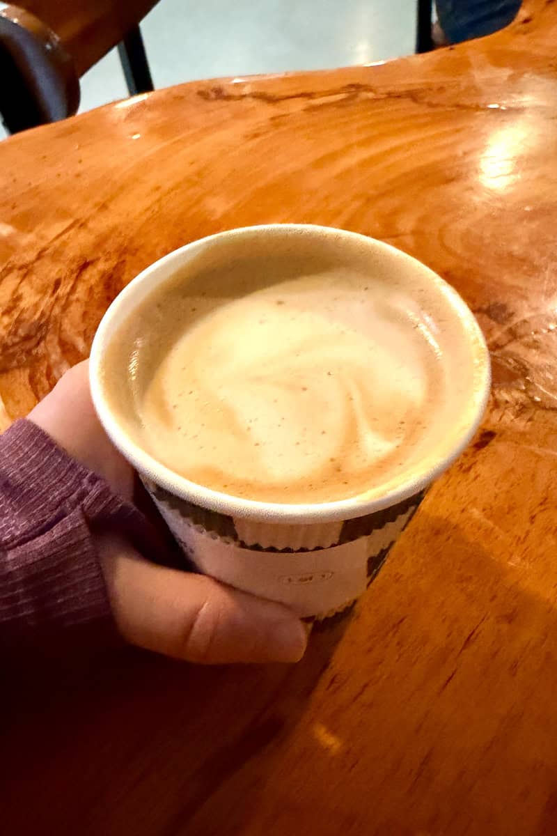Latte in disposable cup.