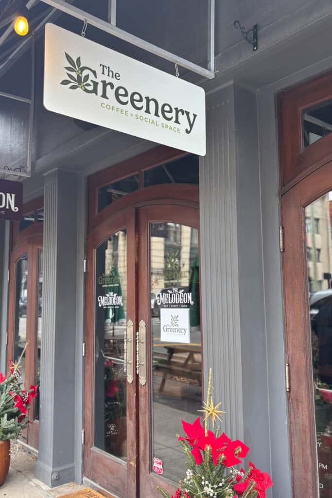 Entrance and sign for The Greenery Coffee Shop.