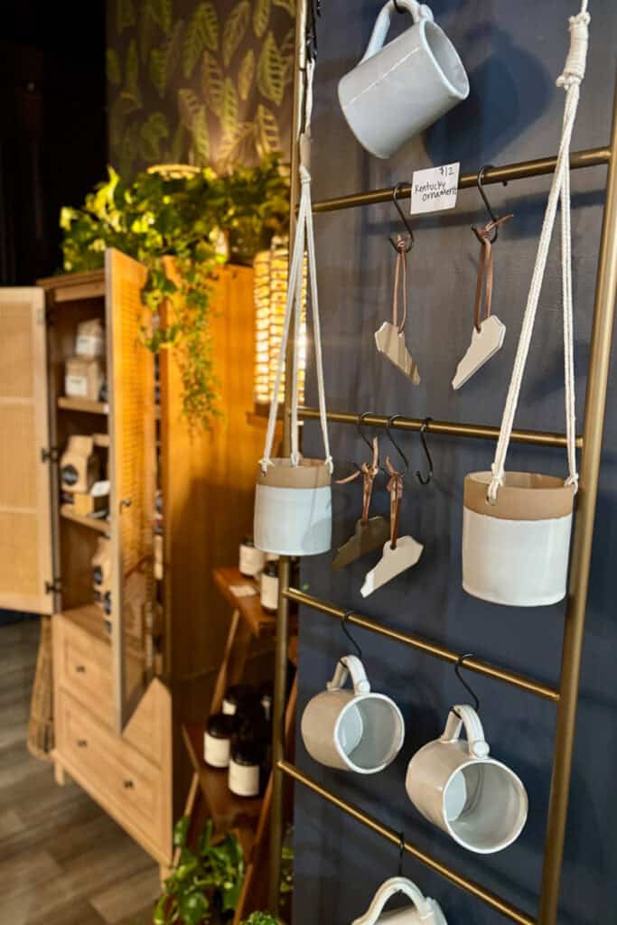 Artisan ceramic mugs and ornaments for sale.