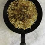 flipped potato pancake back in pan.