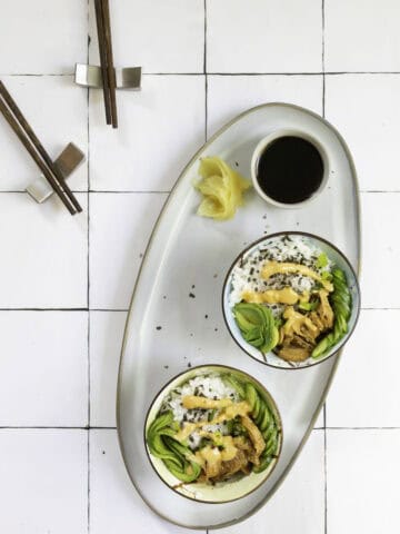 smoked salmon poke bowls on a countertop.