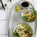 smoked salmon poke bowls on a countertop.