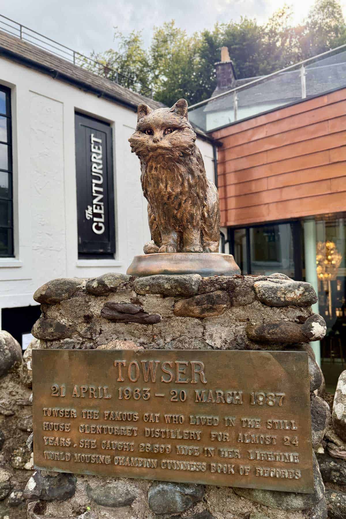Sculpture and sign for Towser the cat, the world champion mouse catcher.